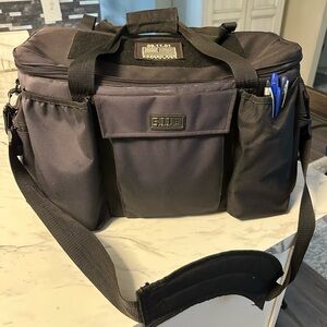 5.11 Tactical Black Patrol Bag with numerous storage pockets/areas.